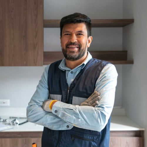 happy contractor inside home