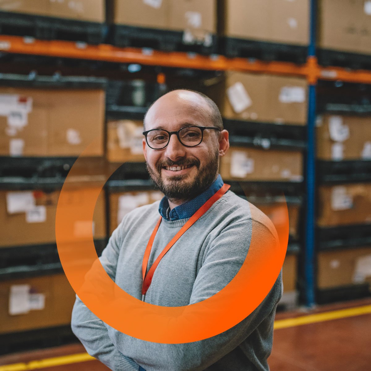 smiling man in warehouse
