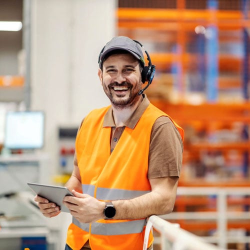 warehouse supervisor with tablet